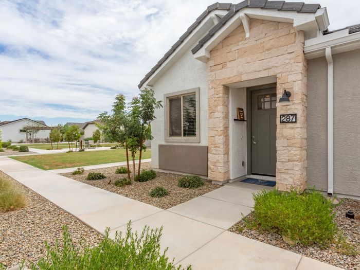 Front entry of a single-storey rental home at Village at Carver Mountain