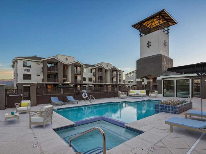 The pool and clock tower at Winfield at the Ranch in Prescott at dusk